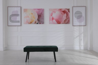 Photo of Bench and beautiful paintings in art gallery