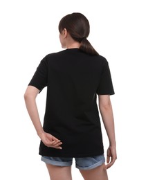 Woman in stylish black t-shirt on white background, back view