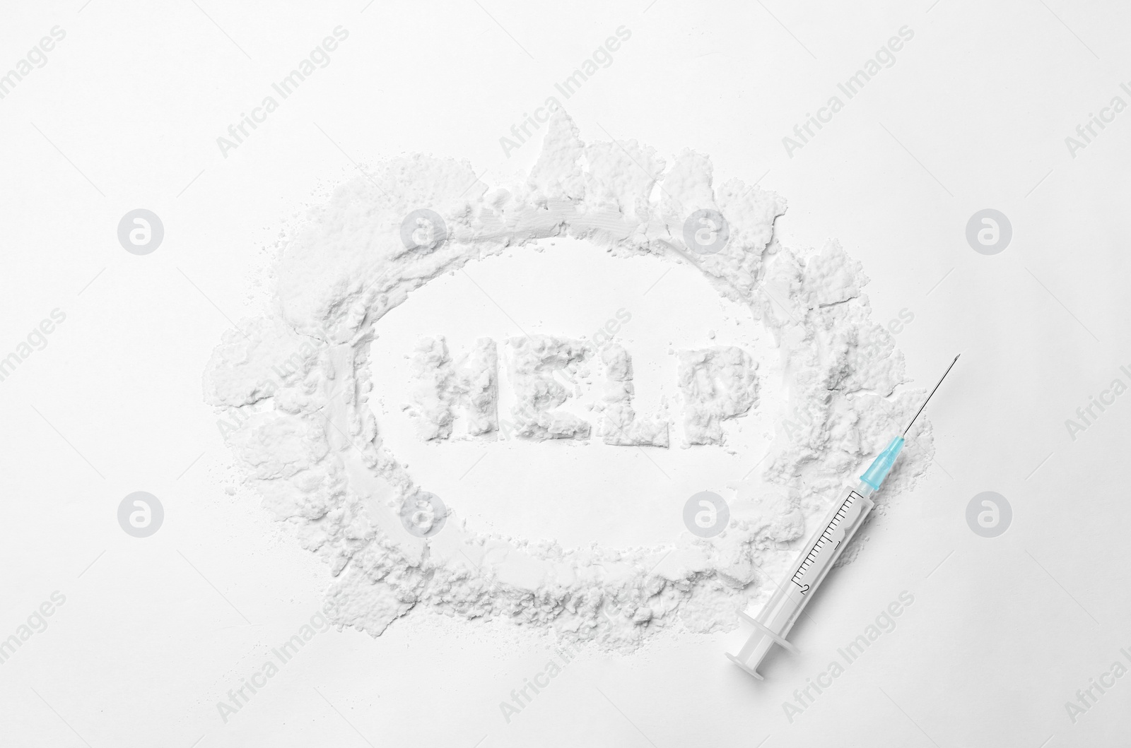 Photo of Word HELP written with cocaine and syringe on white background, top view