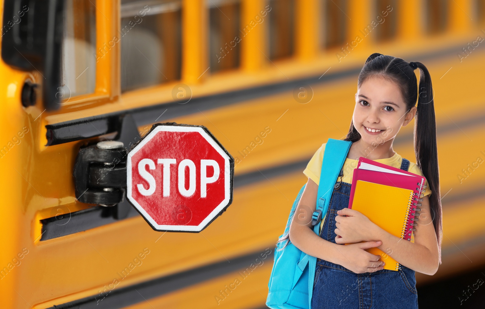 Image of Girl with backpack near yellow school bus. Transport for students