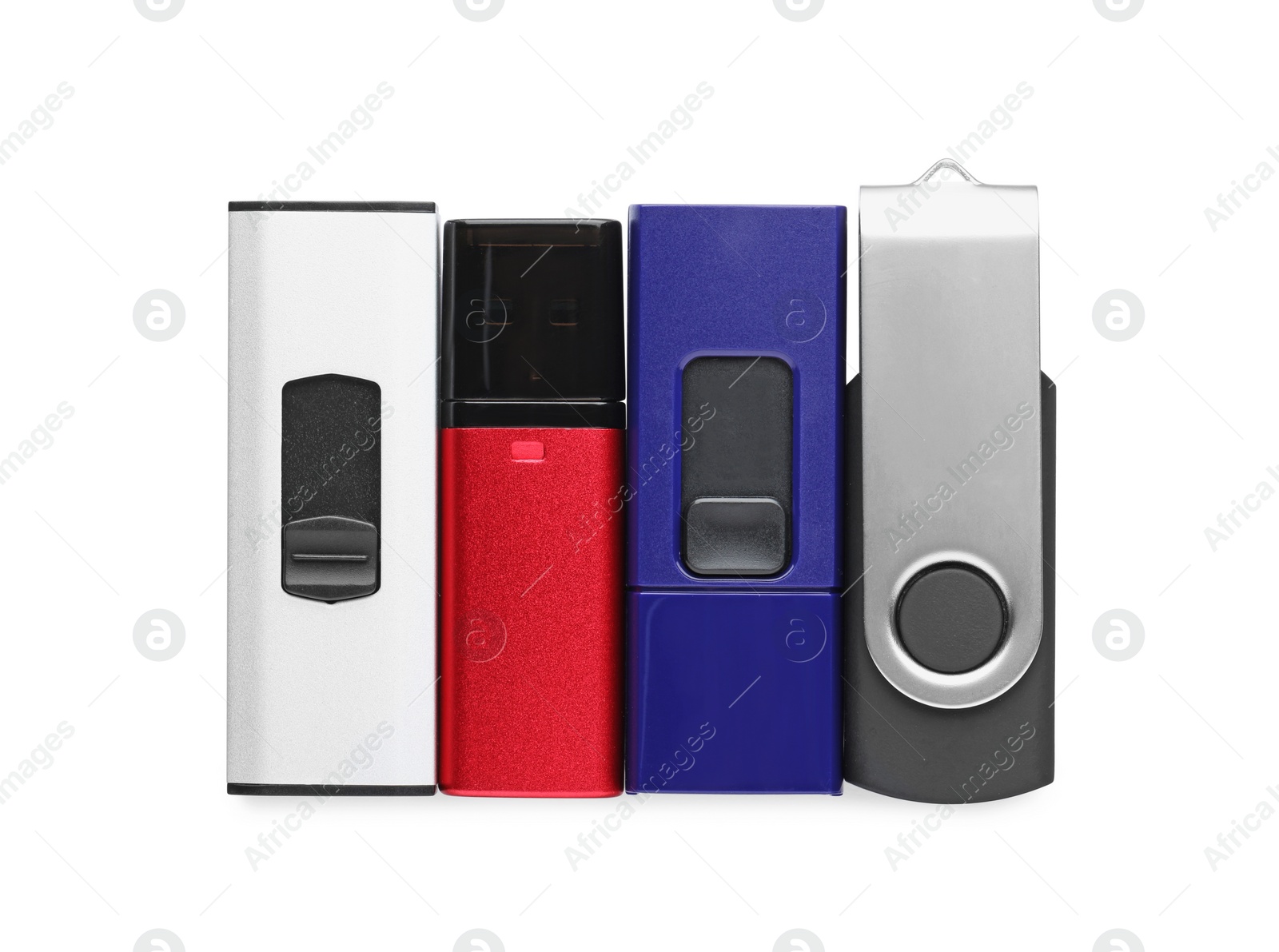 Photo of Modern usb flash drives on white background, top view