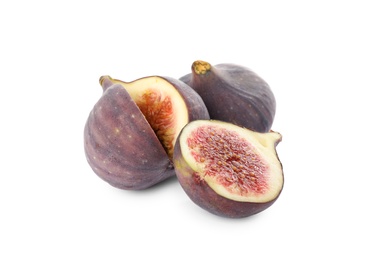 Photo of Whole and cut tasty fresh figs isolated on white