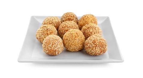 Photo of Plate of delicious sesame balls on white background