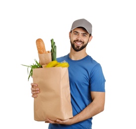 Photo of Man holding paper bag with fresh products on white background. Food delivery service