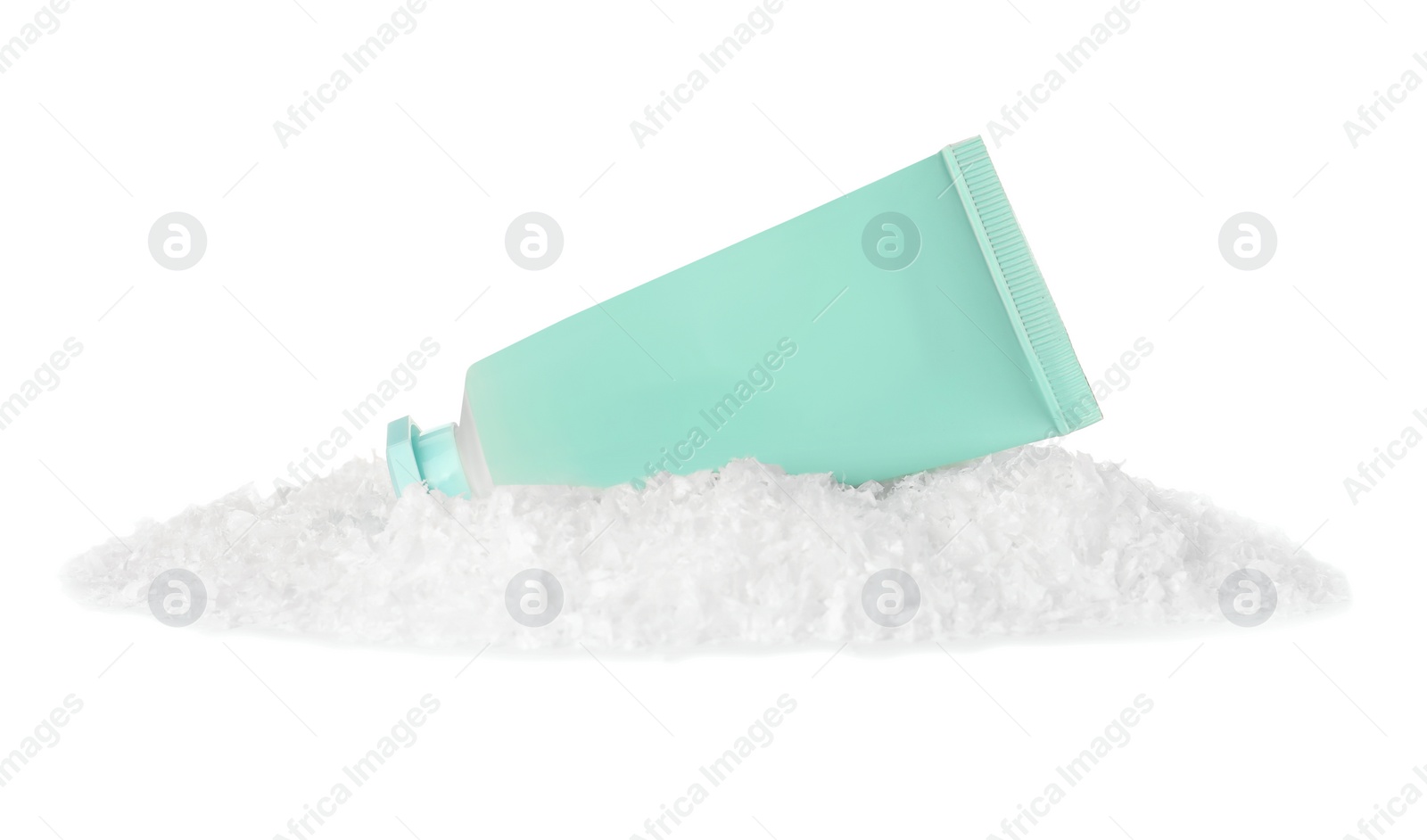 Photo of Tube of hand cream and decorative snow isolated on white. Winter skin care