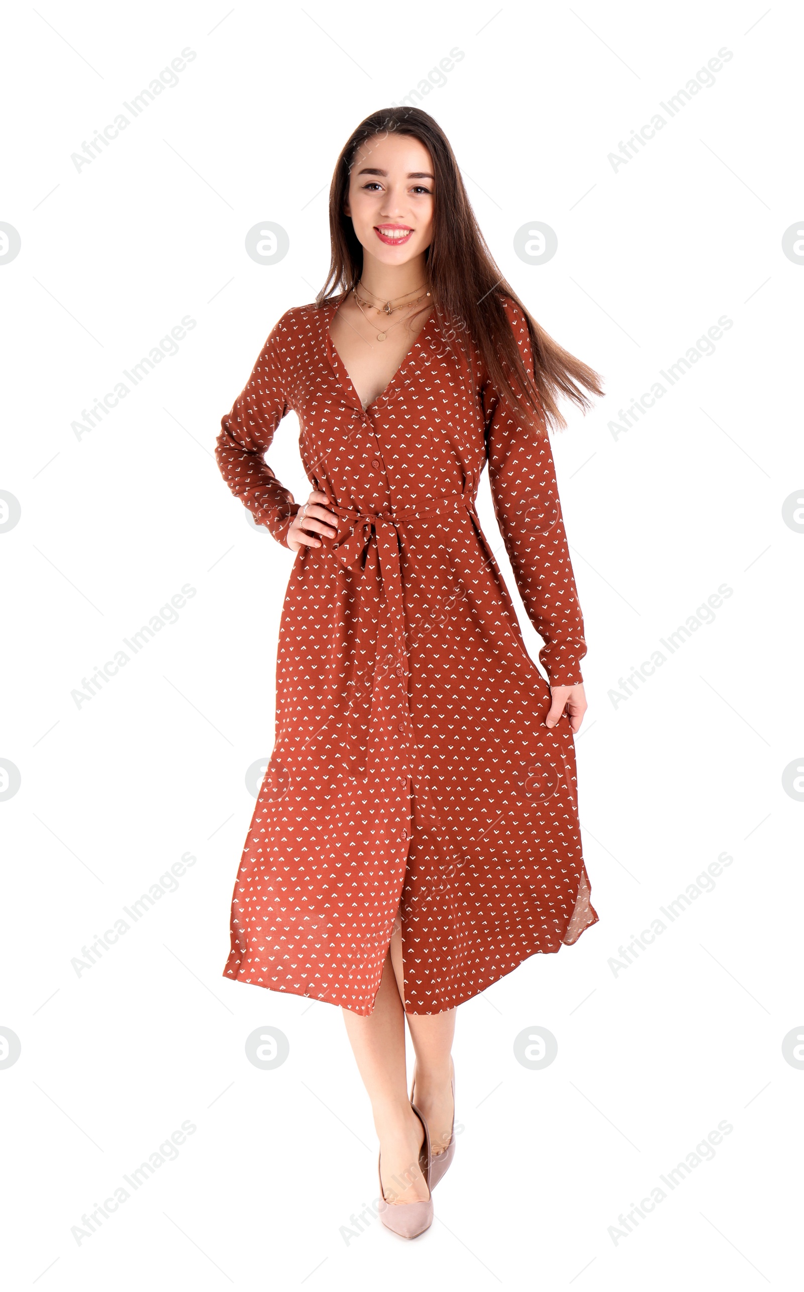 Photo of Portrait of beautiful young woman in stylish dress on white background