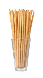 Delicious grissini sticks in glass on white background