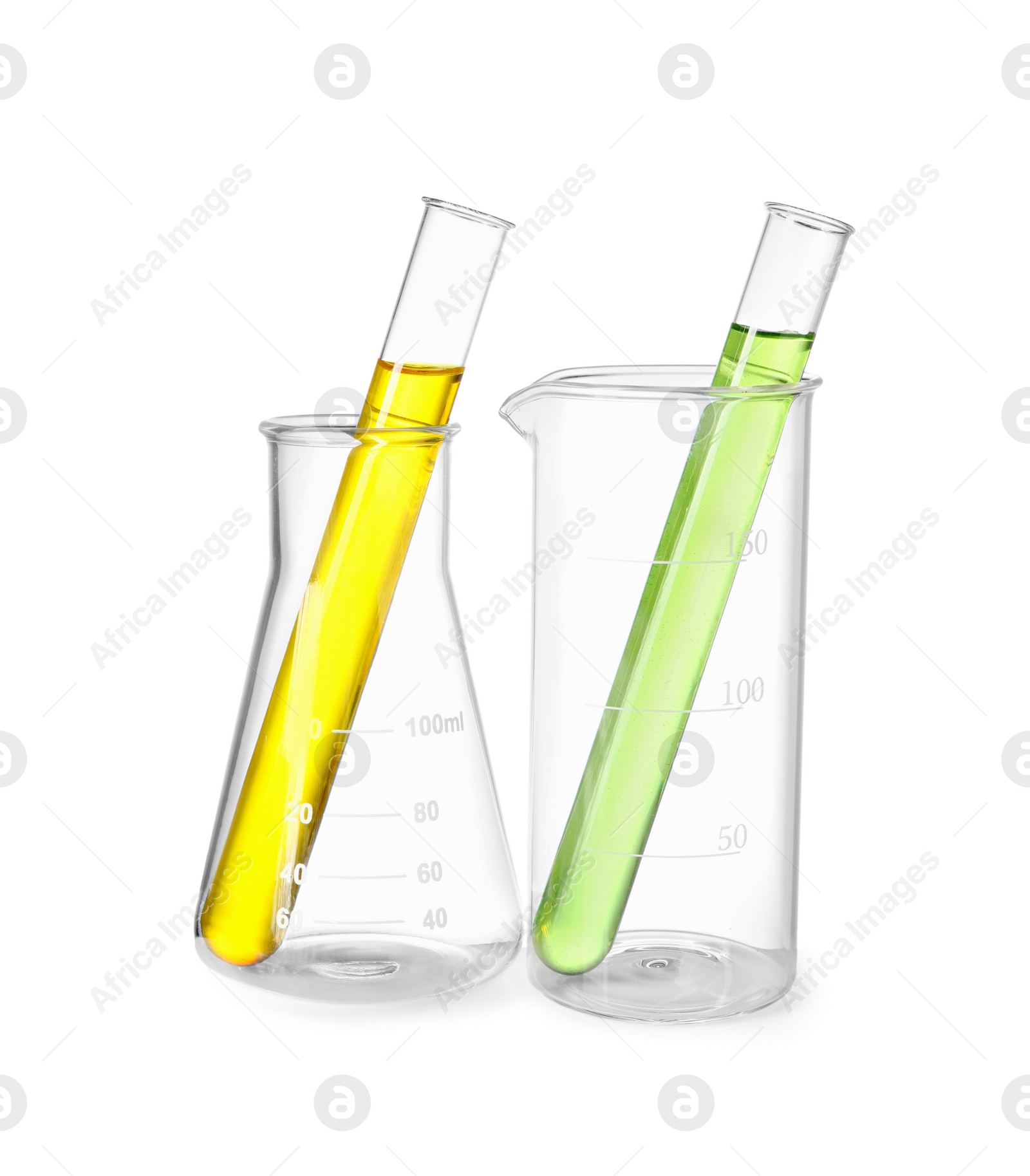 Photo of Glass flask, beaker and test tubes with colorful liquids isolated on white