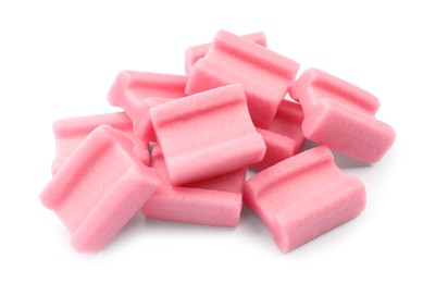 Photo of Pile of tasty pink chewing gums on white background