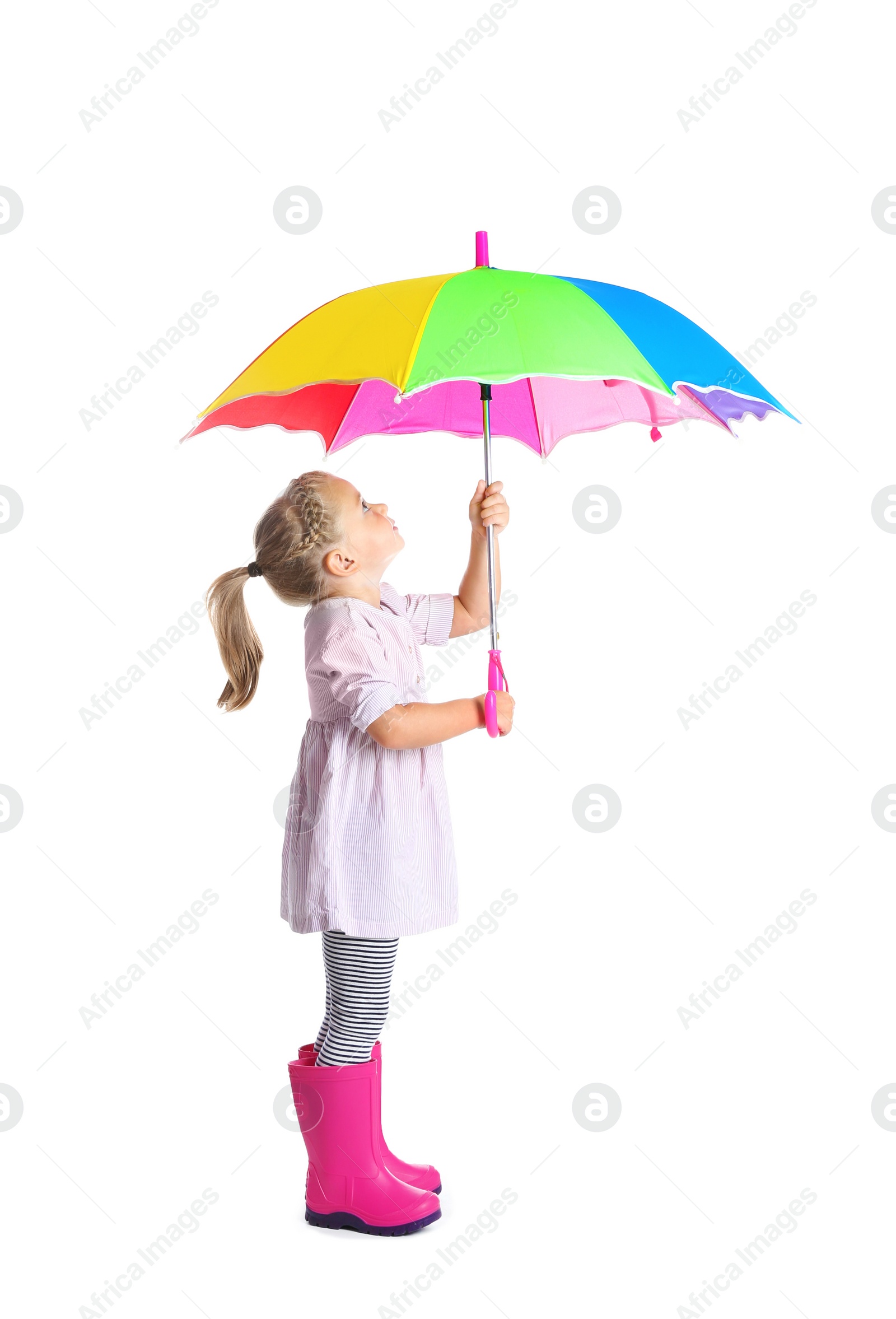 Photo of Little girl with rainbow umbrella on white background