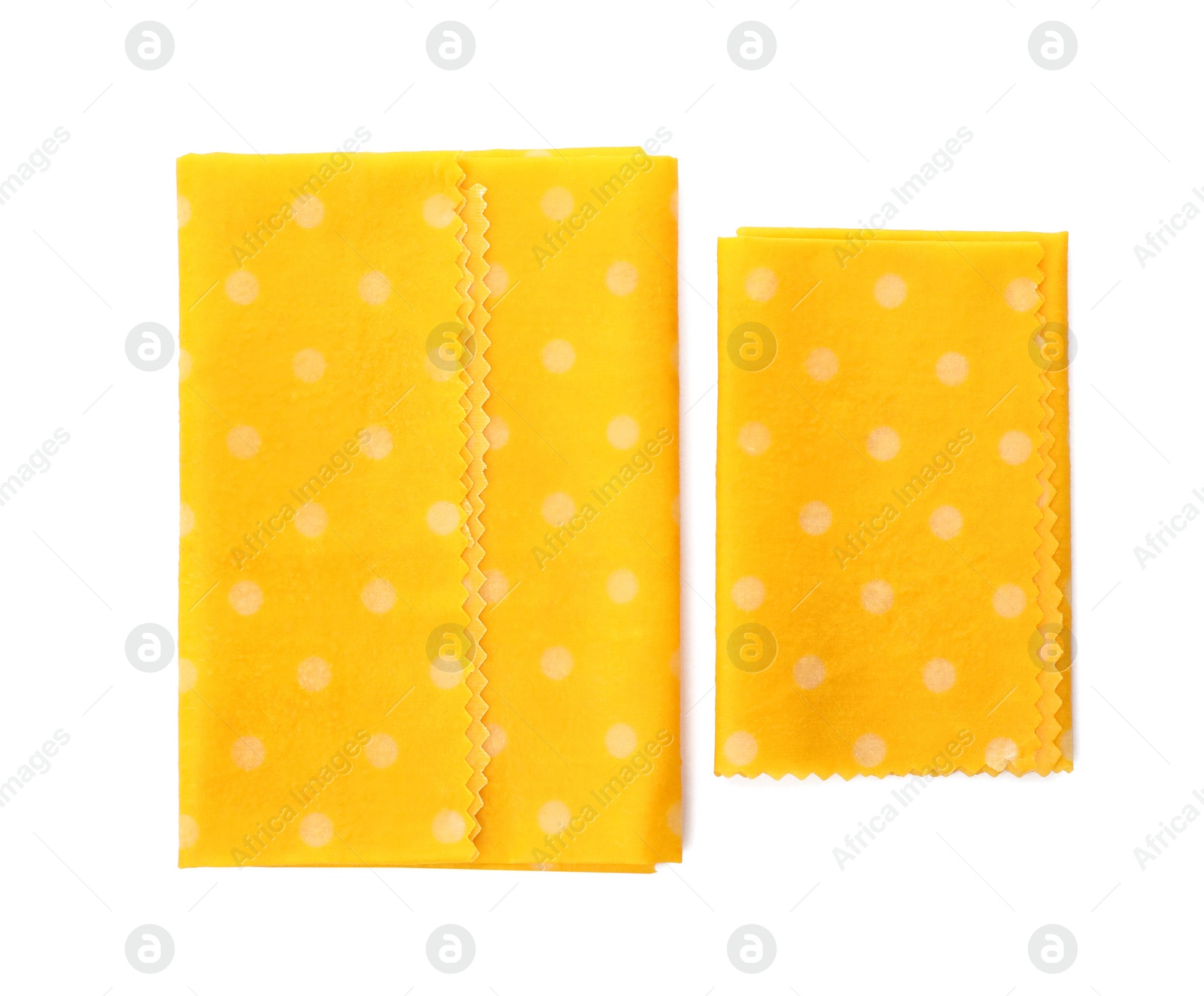 Photo of Reusable beeswax food wraps on white background, top view