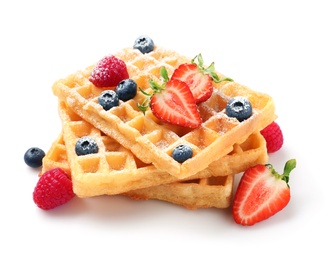 Photo of Delicious waffles with berries on white background