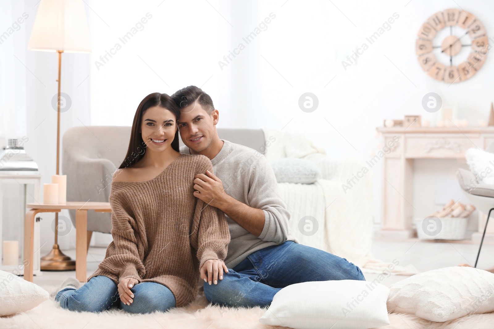 Photo of Happy couple spending time together at home. Winter vacation