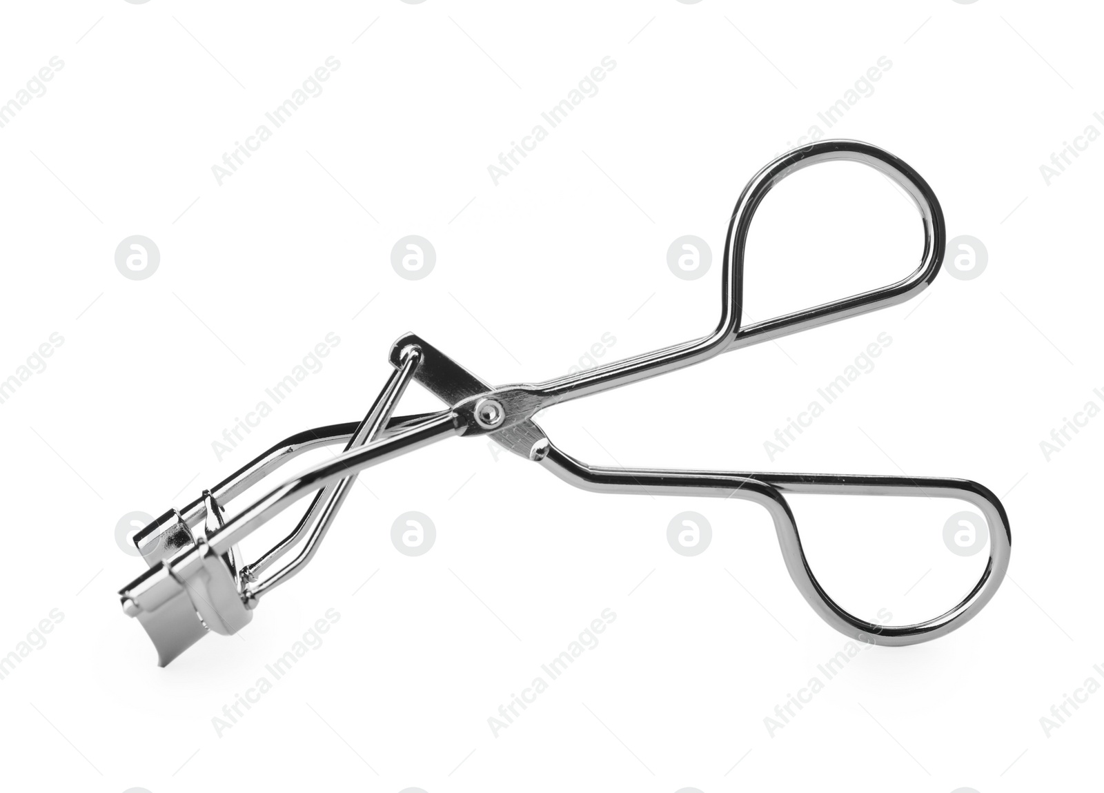 Photo of Eyelash curler isolated on white. Makeup tool