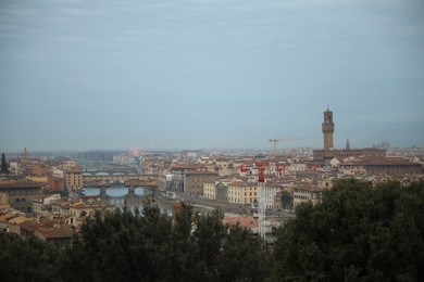 Florence, Italy - February 8, 2024: Picturesque view of city with beautiful buildings under sky