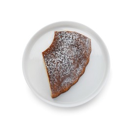Photo of Piece of homemade yogurt cake with powdered sugar on white background, top view