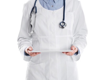 Female doctor holding modern tablet on white background, closeup