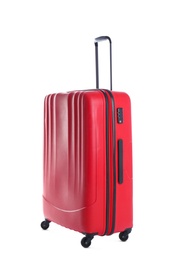 Photo of Red suitcase for travelling on white background