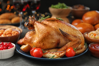 Traditional festive dinner with delicious roasted turkey served on table