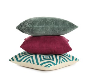 Stack of colorful decorative pillows on white background