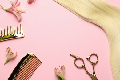 Photo of Hairdresser tools. Blonde hair lock, combs, scissors and flowers on pink background, flat lay. Space for text