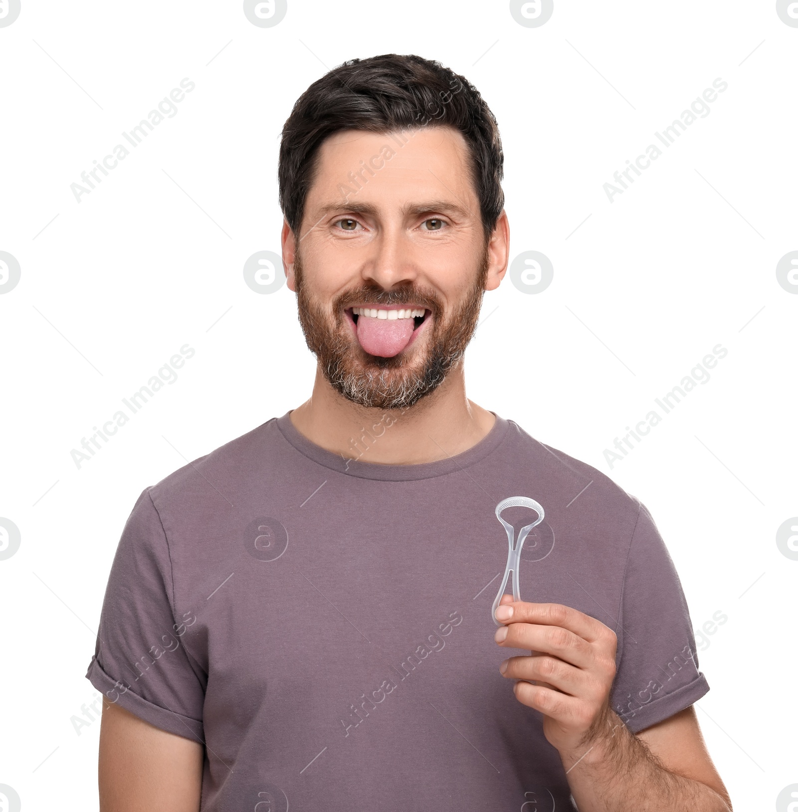 Photo of Happy man with tongue cleaner on white background