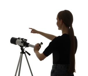 Photo of Young astronomer with telescope on white background