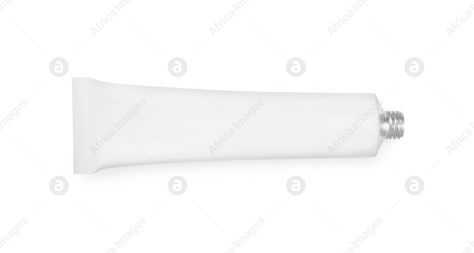 Photo of Open tube of ointment isolated on white, top view. Space for text
