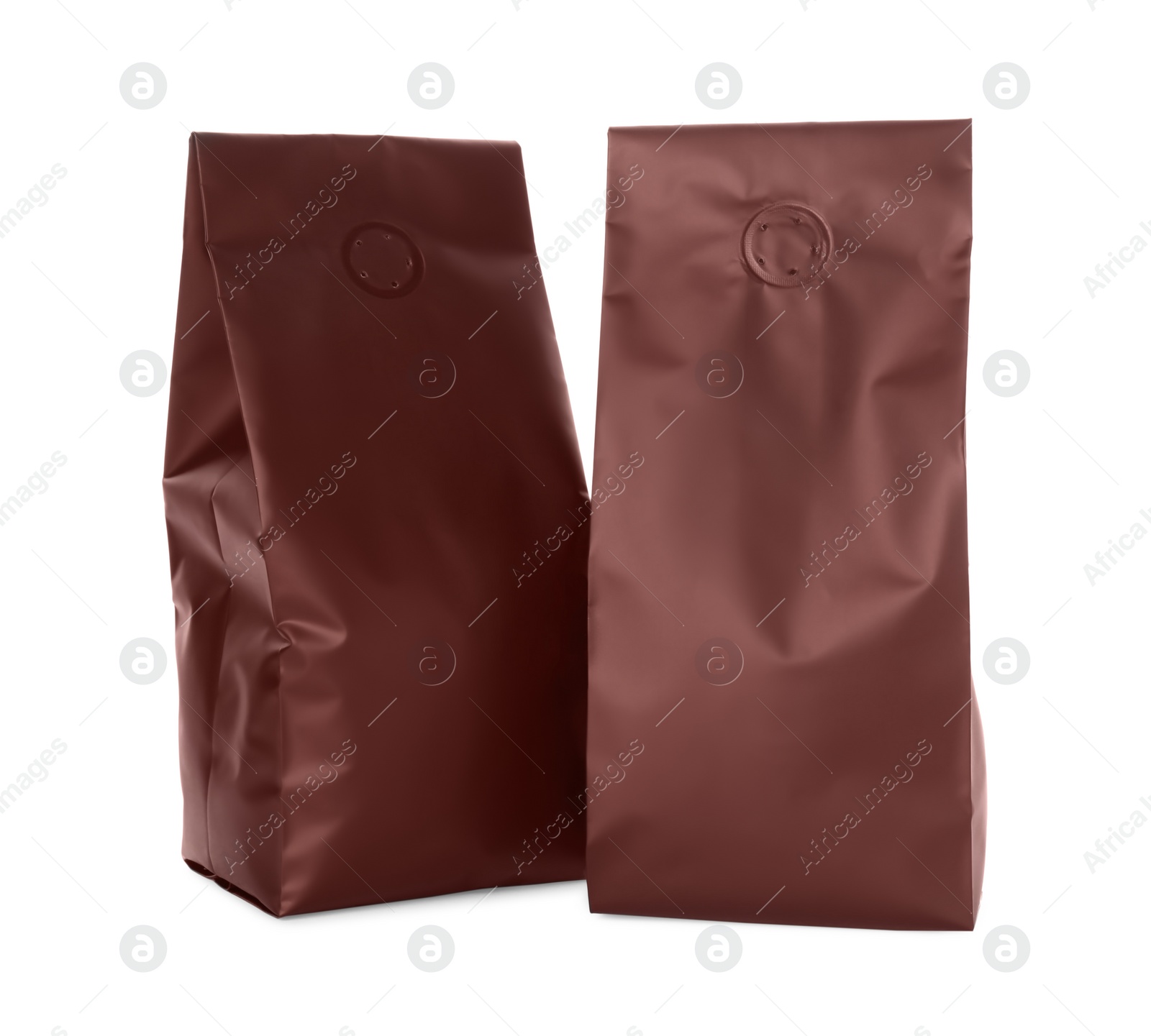 Photo of Two blank foil packages isolated on white