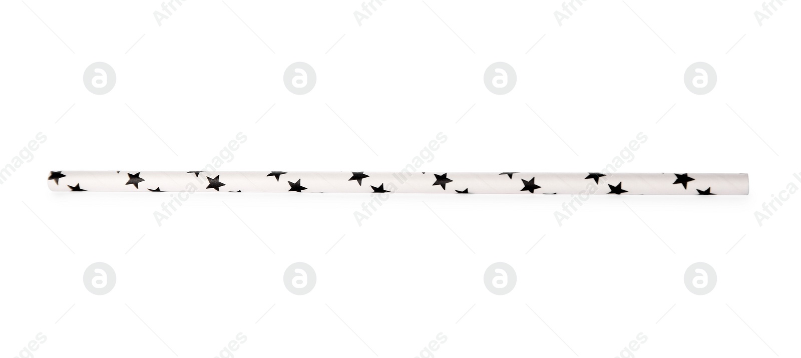 Photo of One paper straw with black stars for drinking isolated on white