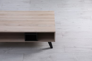 Photo of Empty wooden console table indoors. Stylish furniture