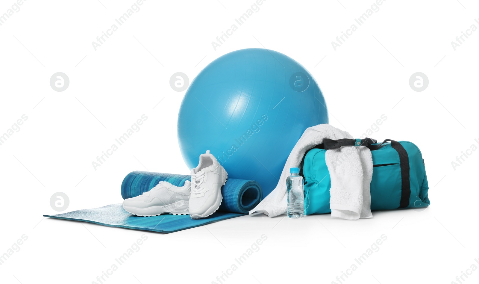 Photo of Fitness ball, gym bag and sport accessories isolated on white