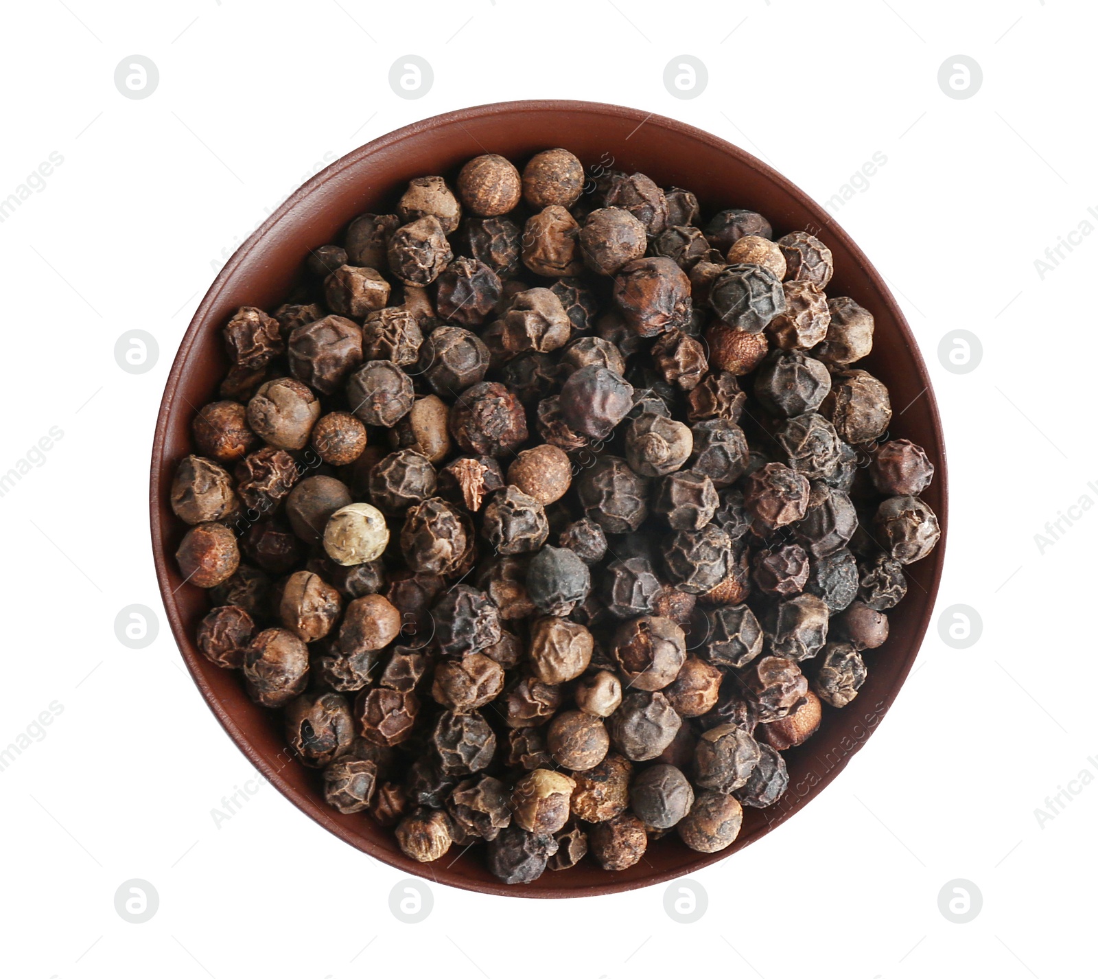 Photo of Bowl of black peppercorns isolated on white, top view