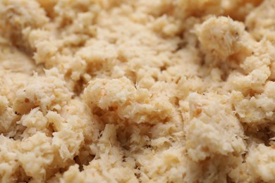 Tasty prepared horseradish as background, closeup view