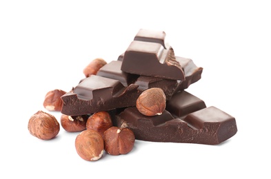 Delicious black chocolate with nuts on white background