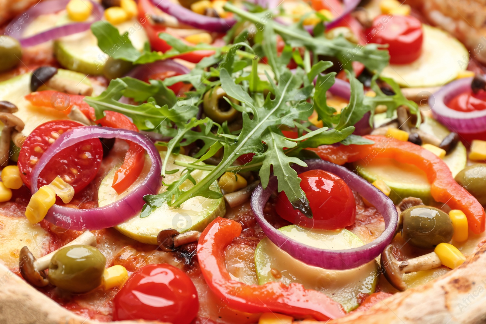 Photo of Delicious fresh vegetable pizza as background, closeup