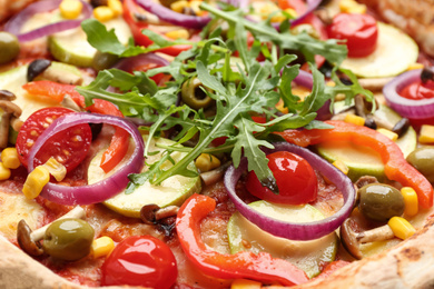 Delicious fresh vegetable pizza as background, closeup