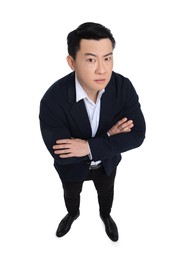 Photo of Businessman in suit posing on white background, above view