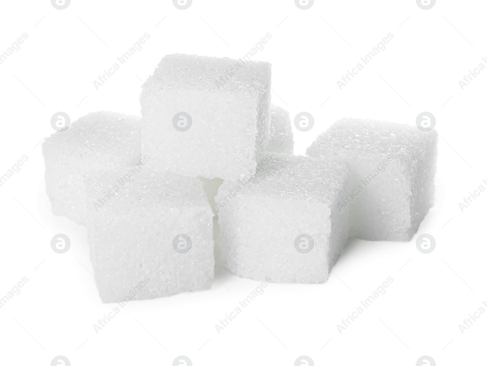 Photo of Many refined sugar cubes isolated on white