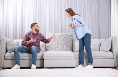 Couple having quarrel at home. Relationship problems