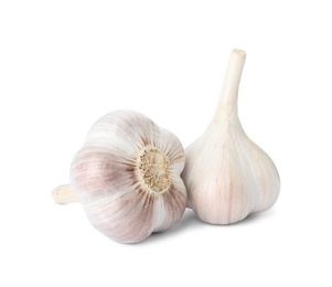 Photo of Fresh organic garlic bulbs on white background