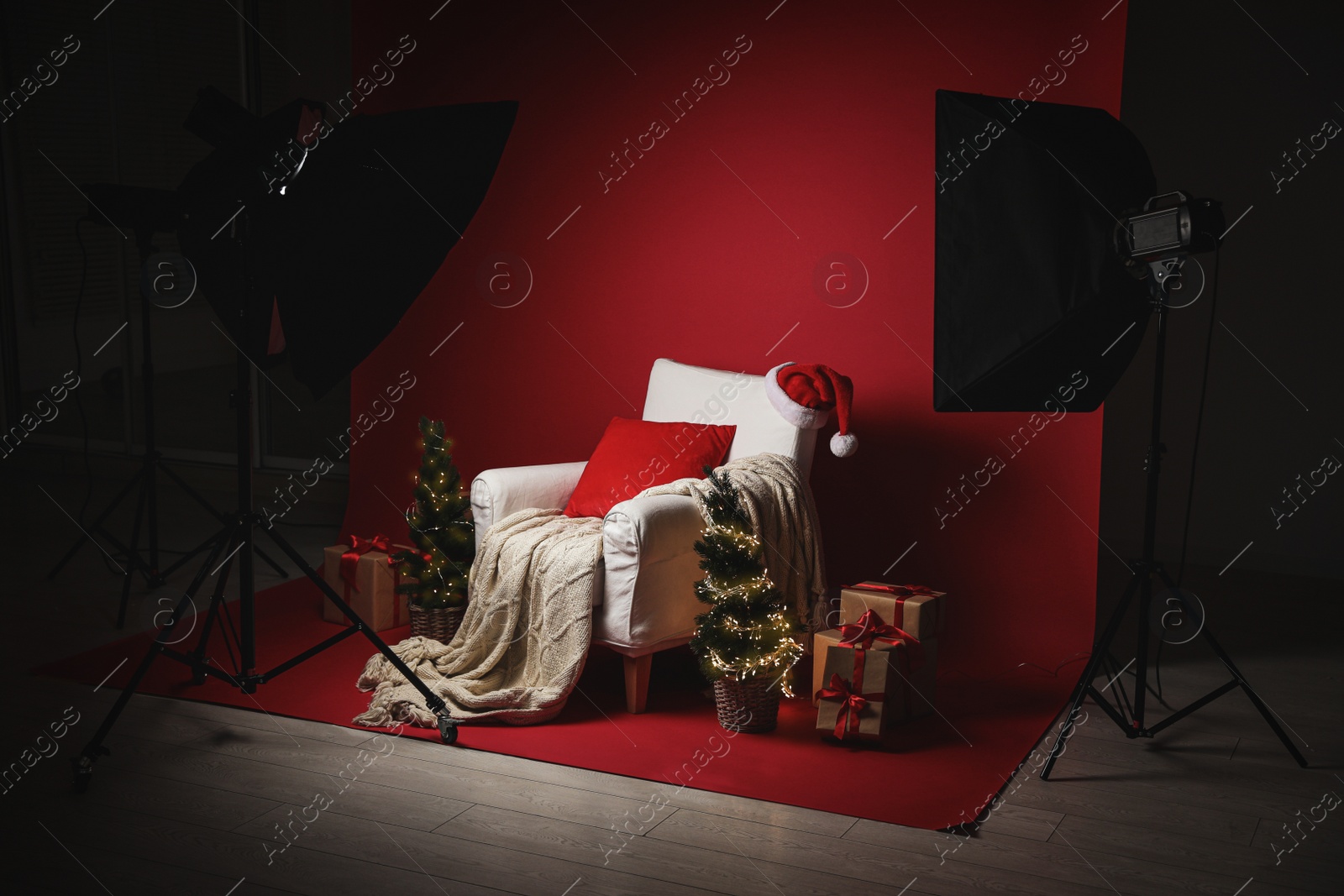 Photo of Beautiful Christmas themed photo zone. Cozy living room interior imitation