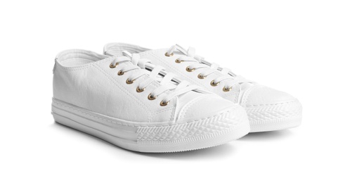 Photo of Pair of stylish sneakers on white background