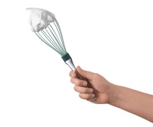 Woman holding whisk with whipped cream on white background, closeup