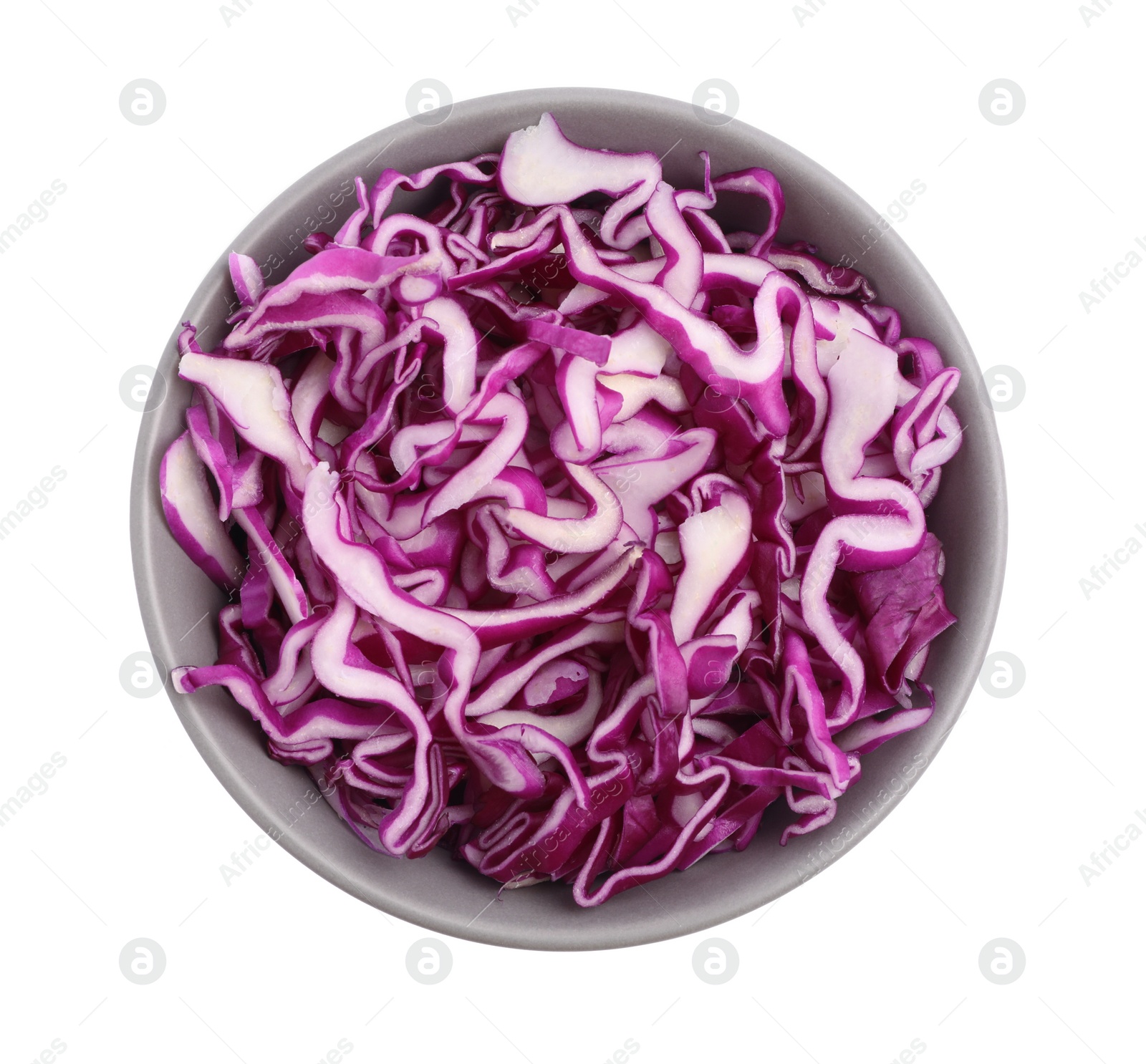 Photo of Bowl with shredded fresh red cabbage isolated on white, top view