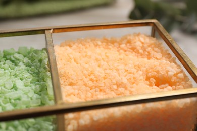 Different types of sea salt on table, closeup