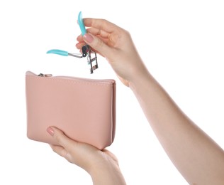 Photo of Woman with cosmetic bag and eyelash curler isolated on white, closeup