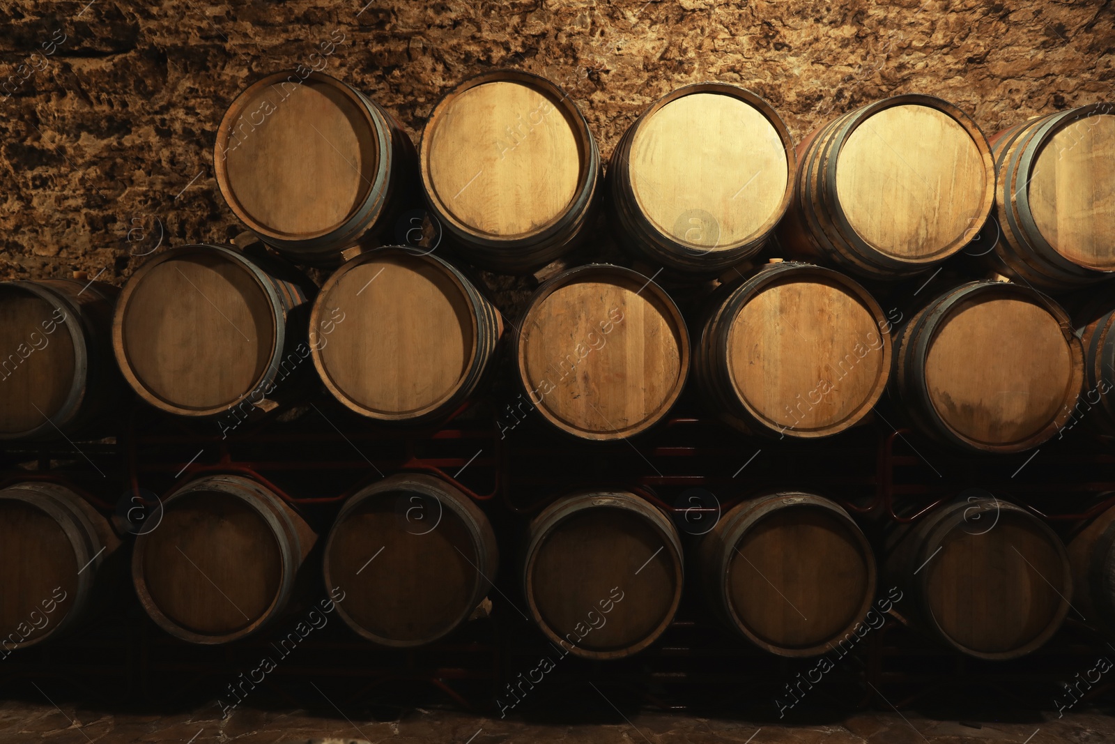 Photo of Wine cellar interior with large wooden barrels