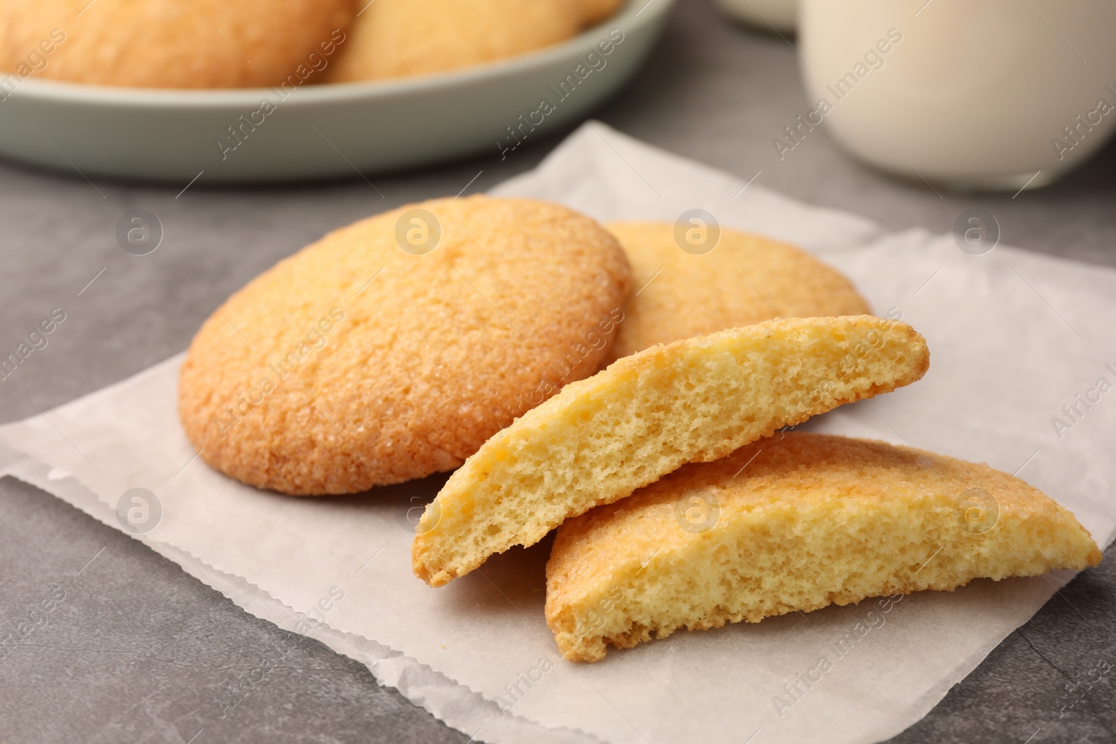 Photo of Delicious Danish butter cookies on grey table, closeup