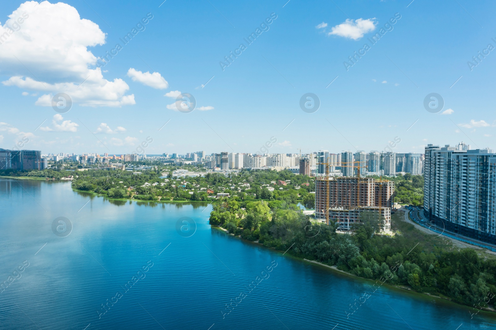 Image of Aerial view of city district on riverside